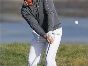 Paul Casey shot a 69 and shares the lead with Shaun Micheel and Brendon de Jonge.