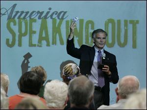 U.S. Rep. Bob Latta (R., Bowling Green) speaks with constituents during a town-hall meeting at Terra Community College in Fremont, Ohio.