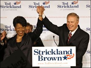 Yvette McGee Brown, left, is introduced earlier this year by Gov. Ted Strickland as his running mate for his re-election.