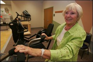 Joyce Bettinger makes good use of the exercise bicycle on her visits to the Sylvania Senior Center.