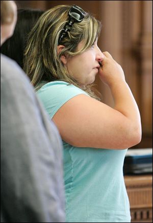 Rebecca Keasler issues a tearful statement in Lucas County Common Pleas Court. 