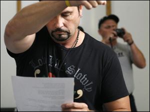 Bob Davenport directs the studio session at the Zeta Recording Studio in Holland. "It means the world to [veterans], just to get acknowledged for the sacrifice they made," he said.