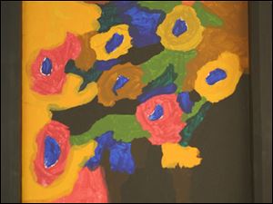 'Poppies on Black' by Steven Henry, is in the Bittersweet Farms show at 20 North Gallery.