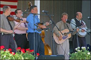 Rick Prater and the Midnight Travelers perform Saturday at Sauder Village in Archbold, Ohio.