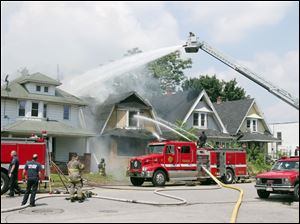Fire crews ballte a blaze at 614 Oak St. in East Toledo.
