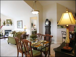 The open floor plan of the villa offers an easy transition from the living room to the dining area.