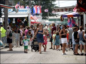 The midway appeared to be crowded in some areas during Wednesday's free day. 