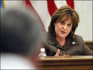 Carol Contrada considers the construction job temporary.
