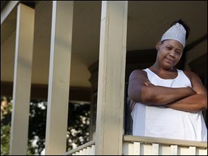 Ybonne Blackwell says she misses seeing Cindy Sumner waving to her as she rode by on her bike. Ms. Blackwell hopes that the warehouse will be torn down in Ms. Sumner's 'loving memory.'