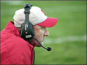 Bedford Coach Jeff Wood says the team's four ‘captain's practices' this year are a tradition that helps get the players in shape. The coaches watch the practice. 
