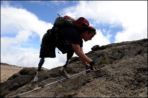 Neil Duncan slowly works his way toward Kilimanjaro's summit on the fourth day of the climb.
