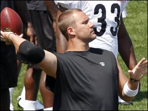 Pittsburgh Steelers quarterback Ben Roethlisberger warms up during the NFL football team's training camp session in Latrobe, Pa., Monday.
