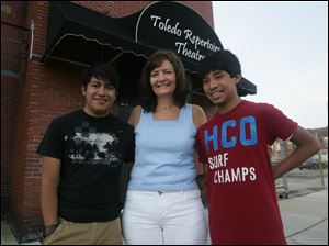 Kathy Echelberry's sons, Phillip, left, and Paul, students at Bowsher High School, have summer jobs. Phillip is an intern at Toledo Repertoire Theatre.