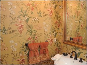 The wallpaper in Lisa Tomasovich's first-floor powder room.