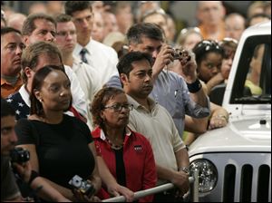 Several hundred Jeep workers listen to Vice President Joe Biden at the Toledo Jeep Assembly complex. He drew cheers when he told them he's owned Jeeps continuously since 1973. 