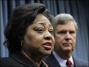 Shirley Sherrod, with Agriculture Secretary Tom Vilsack, says she looks forward to some sort of relationship with the department in the future.
