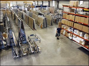 Residential customers are able to visit Cutting Edge to select from its inventory of natural stone slabs and other materials. 