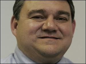 Councilman Tim Guzman said the village cannot continue borrowing as it has.