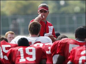 Ohio State head coach Jim Tressel talks to his team after football practice last month in Columbus