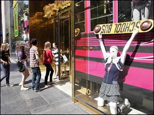 A back-to-school display in front of Juicy Couture in New York draws in teens looking for new fall fashions.
