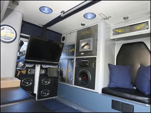 The Jambulance boasts a 32-inch flatscreen TV equipped with satellite TV and video game hookups, a generator, stereo, two onboard computers, touchscreen monitors, and a full-size grill.