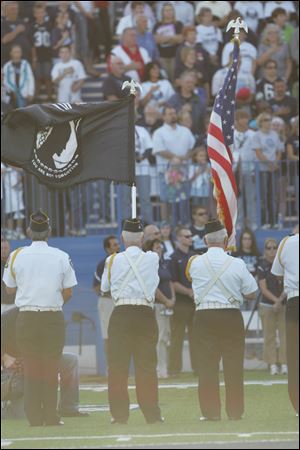 The Honor Guard presents the colors before the national anthem. The Lake football team took on Northwood High School.