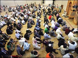CTY EID10p   The Blade/Lori King  09/10/2010  Muslims listen to speaker Board of Trustees member Dr. Abed El. Manan Alo,who spoke after the prayer service to celebrate Eid ul-Fitr at the Masjid Saad in Sylvania, Ohio. Eid ul-Fitr is a holiday marking the end of the holy month of Ramadan.