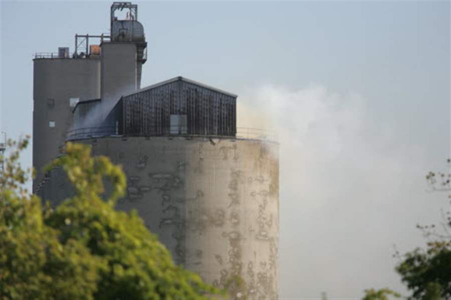Fire-crews-break-hole-into-grain-elevator-to-douse-fire-threat-of-explosion-ruled-out