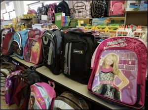 Backpacks wait to be chosen.