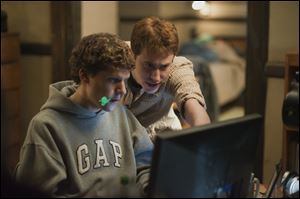 Jesse Eisenberg, left, stars with Andrew Garfield in 'The Social Network'