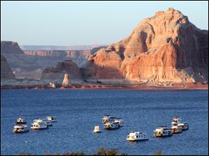 Boats idle at Wahweap Marina, the hub of activity in Lake Powell, near Utah's border with Arizona.
