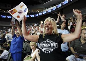 Denise Bajas of Toledo cheers with the crowd gathered inside the Huntington Center in May for a viewing party for 'American Idol' contestant Crystal Bowersox.