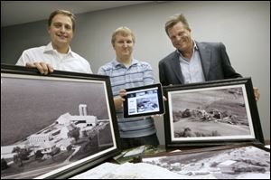 Paul Clark, left, Kevin Marsh, center, and Ken Krieg, founders of Vintage Aerials in Maumee, display aerial photographs in print and digital form.