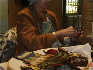 CTY pearson04p  Maumee Bay Basket Weavers Guild member Kathy (cq) Clark, of Oregon, weaving a basket at Pearson Park. The weavers participate in the St. Mark's craft show which is held on the first Saturday in November. The annual Black Swamp Festival at Pearson Metropark (cq) in Oregon, Ohio on October 3, 2010. The event is co-sponsored with Friends of Pearson. Jetta Fraser/The Blade