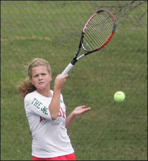 Central Catholic's Morgan delp hits a shot in her 6-1, 6-1 victory over Notre Dame's Megan McNamara in the City League tournament's No. 1 singles final at Jermain Park. The Irish won all three singles and both doubles finals to repeat as champions. 