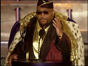 Solomon Burke, one of the pioneers of soul music, gestures to the audience after being inducted into the Rock and Roll Hall of Fame in this March 19, 2001.
