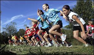 Sylvania students bolt from the starting line at an event in Secor Metropark.
