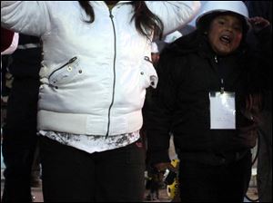 Relatives of 34-year-old miner Claudio Yanez cheer as he was pulled from the mine, which collapsed Aug. 5.