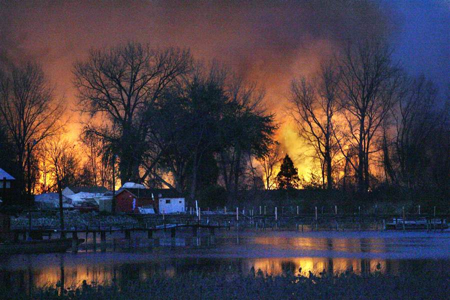 Blaze-in-marsh-burns-near-Erie-Township-homes
