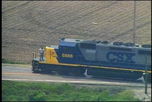 Jon Hosfeld, a CSX official, walks back to stop a runaway train after he jumped on board south of Kenton, Ohio, on May 15, 2001. The runaway freight train, carrying hazardous materials, rolled for miles through Ohio at speeds close to 50 mph with no one aboard.