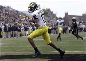 Michigan sophomore Roy Roundtree, who originally committed to Purdue, hauled in six catches for 69 yards and a touchdown.