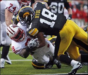 Micah Hyde, who was an all-state quarterback at Fostoria, is now the second-leading tackler for the Hawkeyes as a defensive back.