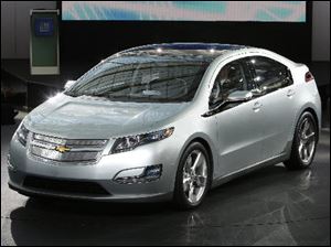 The Chevrolet Volt is unveiled at a General Motors centennial celebration in Detroit.