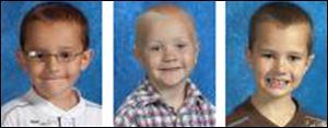 The Skelton brothers Alex, 7, left, Tanner, 5, center, and Andrew, 9, are feared dead.