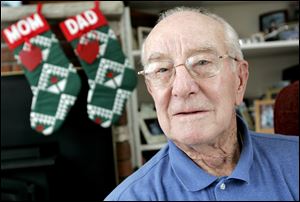 Bob Sawyer says holidays in Toledo were ‘tight' during the Great Depression. He began peddling The Blade in 1930, when he was 7 years old, to buy the clothes and shoes he needed for school each year.