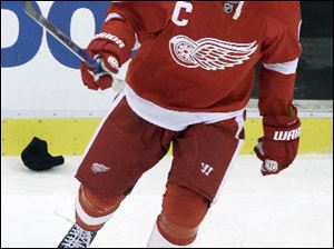 Nicklas Lidstrom had three goals and an assist to power the Red Wings past the St. Louis Blues Wednesday night.