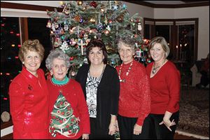 From left, Deby Buerk, Fran Anderson, Kim Laclair, Sue Savage, and Nancy Alter at the Savage family's annual open house.