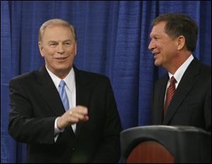 In October, Ohio Gov. Ted Strickland and his Republican challenger John Kasich acknowledged supporters after their debate at the University of Toledo. Mr. Kasich won the election as part of a GOP sweep.