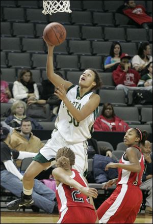 Azia Bishop goes to the hoop for two of her 23 points. The Start senior also pulled down 12 rebounds.
<br>
<img src=http://www.toledoblade.com/graphics/icons/photo.gif> <font color=red><b>VIEW GALLERY:</b></font> <a href=