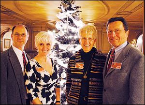 Mike and Deb Calabrese with Mary and Glenn Richter at the Toledo School for the Arts holiday reception.